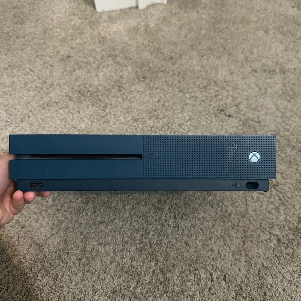 Xbox Console with Black Controller and Red Headset